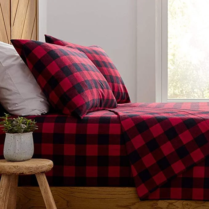 Red and black buffalo check flannel bedding in a close-up